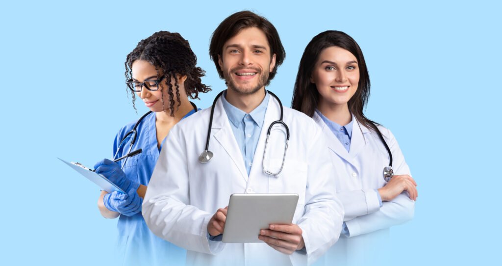 cheerful multiracial doctors posing on blue, holding digital tablet